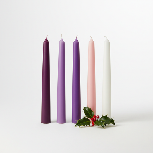 Advent Candles — 3 purple, 1 pink, 1 white taper candles studio photo